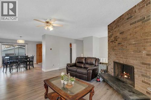 108 Whiteglen Crescent Ne, Calgary, AB - Indoor Photo Showing Living Room With Fireplace