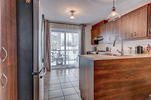 Cuisine - 135 Rue Deschambault, Saint-Jérôme, QC - Indoor Photo Showing Kitchen With Double Sink