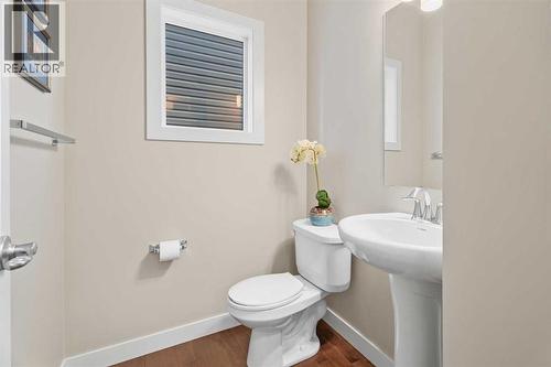 Half bathroom - 308 Chaparral Valley Way Se, Calgary, AB - Indoor Photo Showing Bathroom