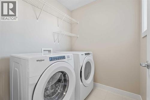 Convenient laundry room - 308 Chaparral Valley Way Se, Calgary, AB - Indoor Photo Showing Laundry Room