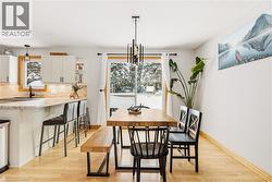 Dining room featuring light wood-type flooring - 