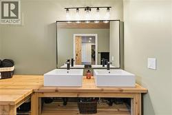 Bathroom featuring double vanity - 