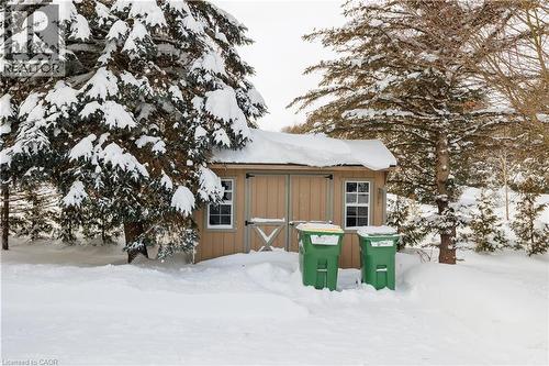 Snow covered structure featuring a shed - 230 Saugeen Street, Grey Highlands, ON - Outdoor