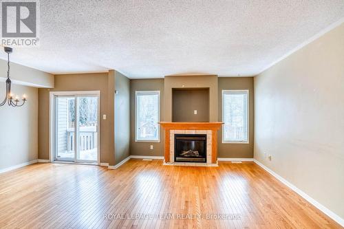 7 Chantilly Gate, Ottawa, ON - Indoor Photo Showing Living Room With Fireplace