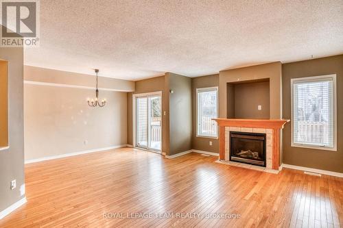7 Chantilly Gate, Ottawa, ON - Indoor Photo Showing Living Room With Fireplace