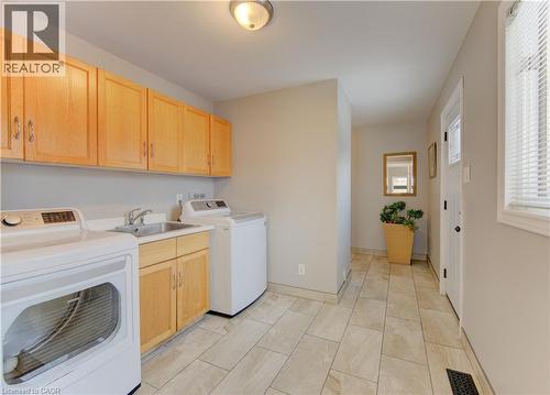 Main floor laundry - 593 Guildwood Place, Waterloo, ON - Indoor Photo Showing Laundry Room