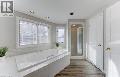 Primary ensuite soaker tub and shower - 593 Guildwood Place, Waterloo, ON - Indoor Photo Showing Bathroom