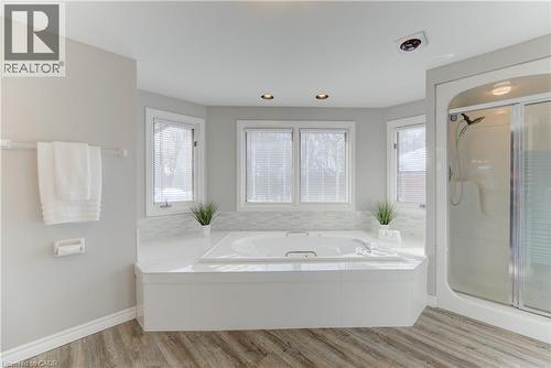 Primary ensuite soaker tub - 593 Guildwood Place, Waterloo, ON - Indoor Photo Showing Bathroom