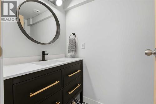 Basement two-piece bathroom - 4 Pardue Close, Red Deer, AB - Indoor Photo Showing Bathroom