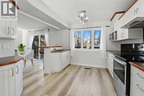 4 Pardue Close, Red Deer, AB - Indoor Photo Showing Kitchen With Double Sink