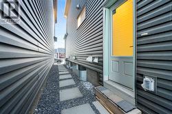 Separate Entrance to Legal Basement Suite - 