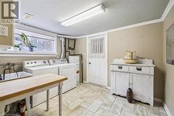 Washroom featuring independent washer and dryer and water heater - 