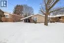 View of snow covered exterior featuring brick siding - 359 Pepper Drive, Burlington, ON  - Outdoor 