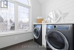 Convenient Upper Level Laundry - 