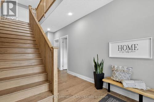 Hardwood floors, stairs & railing - 150 Plewes Drive, Collingwood, ON - Indoor Photo Showing Other Room