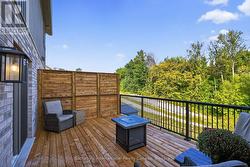 Back yard looks onto green space and trail - 