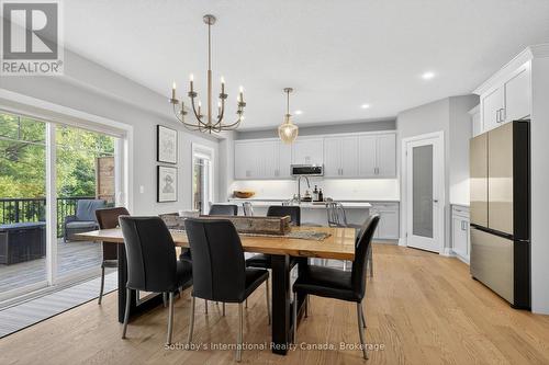 Sliding doors off dining area leading to deck - 150 Plewes Drive, Collingwood, ON - Indoor Photo Showing Dining Room
