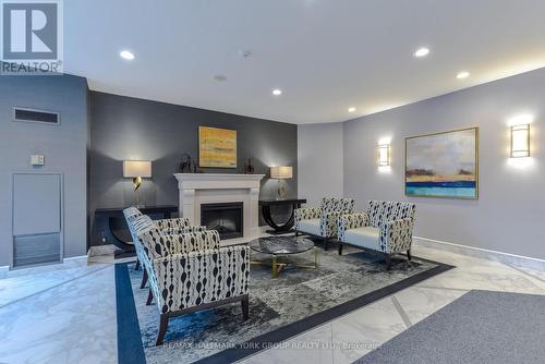 406 - 100 Observatory Lane, Richmond Hill, ON - Indoor Photo Showing Other Room With Fireplace