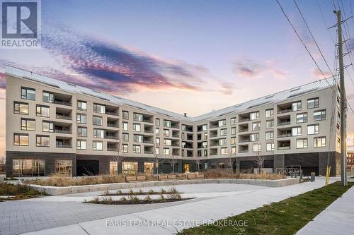 216 - 31 Huron Street, Collingwood, ON - Outdoor With Facade