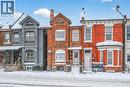 View of front of house featuring brick siding and a chimney - 77 Barton Street E Unit# 2, Hamilton, ON  - Outdoor With Facade 