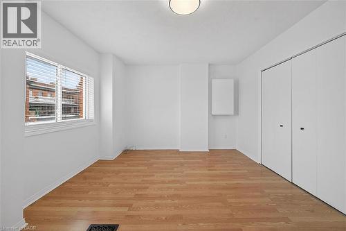 Livingroom with enclosed laundry. - 77 Barton Street E Unit# 2, Hamilton, ON - Indoor Photo Showing Other Room