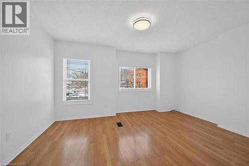 Livingroom filled with natural light. - 77 Barton Street E Unit# 2, Hamilton, ON - Indoor Photo Showing Other Room