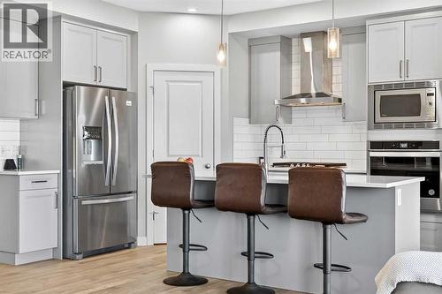77 Belvedere Drive Se, Calgary, AB - Indoor Photo Showing Kitchen With Upgraded Kitchen