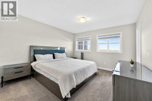 77 Belvedere Drive Se, Calgary, AB - Indoor Photo Showing Bedroom