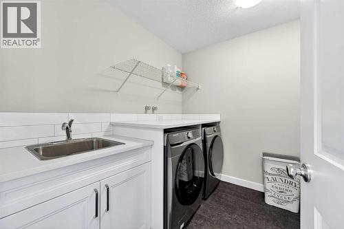 77 Belvedere Drive Se, Calgary, AB - Indoor Photo Showing Laundry Room