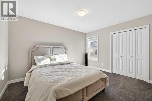 77 Belvedere Drive Se, Calgary, AB - Indoor Photo Showing Bedroom