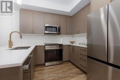 65 Esban Drive, Ottawa, ON - Indoor Photo Showing Kitchen With Stainless Steel Kitchen With Double Sink