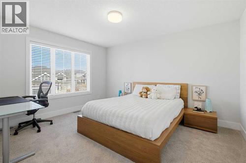 67 Aspen Vista Way Sw, Calgary, AB - Indoor Photo Showing Bedroom
