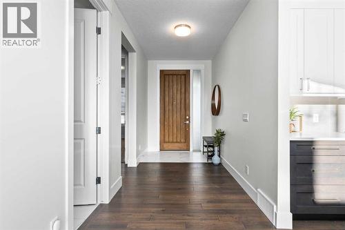 67 Aspen Vista Way Sw, Calgary, AB - Indoor Photo Showing Other Room