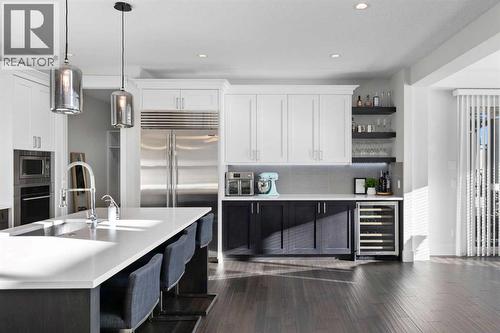 67 Aspen Vista Way Sw, Calgary, AB - Indoor Photo Showing Kitchen With Double Sink With Upgraded Kitchen