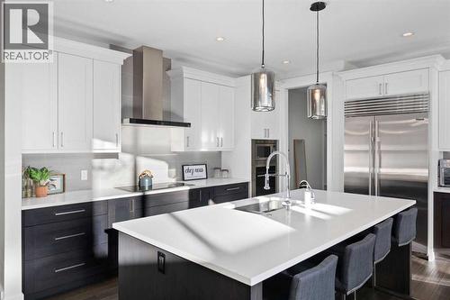 67 Aspen Vista Way Sw, Calgary, AB - Indoor Photo Showing Kitchen With Upgraded Kitchen