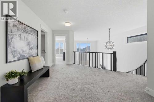 67 Aspen Vista Way Sw, Calgary, AB - Indoor Photo Showing Other Room