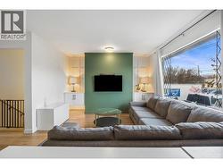 Bright, open living space with modern updates and new paint. Perfect for relaxing or entertaining. Clean, move-in-ready condition throughout. - 