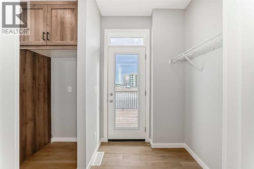 PLEASE NOTE: Photos are of a DIFFERENT Spec Home of the same model – fit and finish may differ. Interior selections and floorplans shown in photos - 85 Starling Boulevard Nw, Calgary, AB - Indoor Photo Showing Other Room