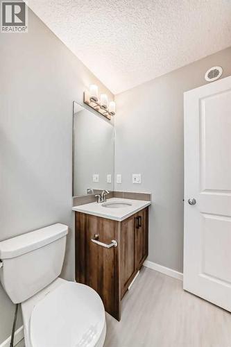 PLEASE NOTE: Photos are of a DIFFERENT Spec Home of the same model – fit and finish may differ. Interior selections and floorplans shown in photos - 85 Starling Boulevard Nw, Calgary, AB - Indoor Photo Showing Bathroom