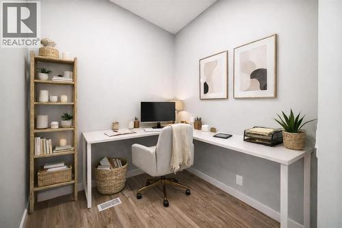 VIRTUALLY STAGED • PLEASE NOTE: Photos are of a DIFFERENT Spec Home of the same model – fit and finish may differ. Interior selections and floorplans shown in photos - 85 Starling Boulevard Nw, Calgary, AB - Indoor Photo Showing Office