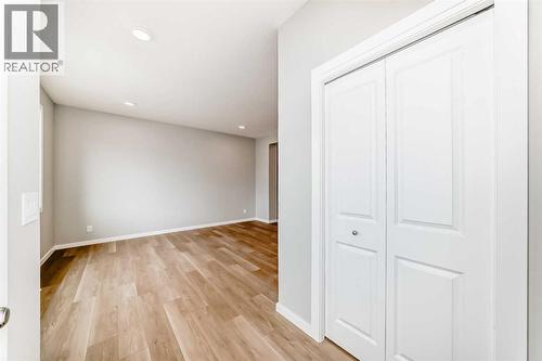 PLEASE NOTE: Photos are of a DIFFERENT Spec Home of the same model – fit and finish may differ. Interior selections and floorplans shown in photos - 85 Starling Boulevard Nw, Calgary, AB - Indoor Photo Showing Other Room