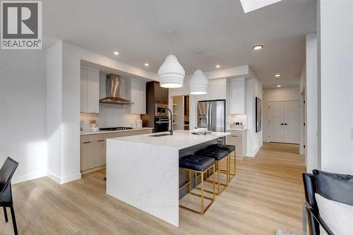 401 Sora Way Se, Calgary, AB - Indoor Photo Showing Kitchen With Stainless Steel Kitchen With Upgraded Kitchen