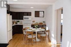 Kitchen. This photo has been virtually staged. - 