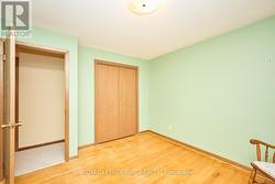 bedroom with hardwood floors - 