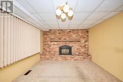 main floor family room with gas fireplace - 
