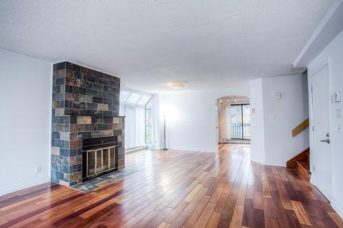 Salon - 155 Rue Terry-Fox, Montréal (Verdun/Île-Des-Soeurs), QC - Indoor Photo Showing Living Room With Fireplace