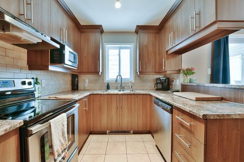 Cuisine - 202-87 Mtée De St-Sulpice, Saint-Sulpice, QC - Indoor Photo Showing Kitchen With Double Sink