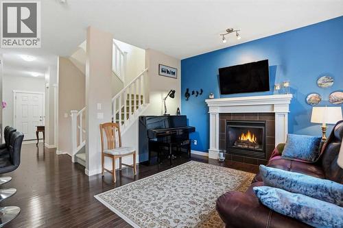 160 Sage Valley Circle Nw, Calgary, AB - Indoor Photo Showing Living Room With Fireplace