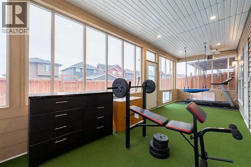A second three-season sunroom located at the basement level.. - 99 Evansglen Circle Nw, Calgary, AB - Indoor
