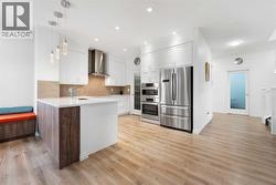 The gorgeous kitchen offers abundant cabinet storage.. - 